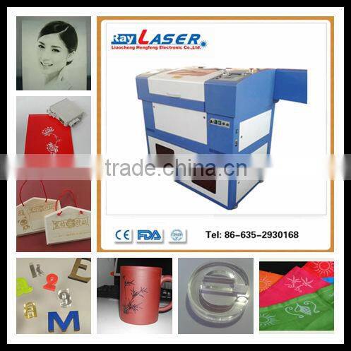 water cooling cooling model CE FDA certification co2 laser engraving cutting machine with trade assurance hot sale