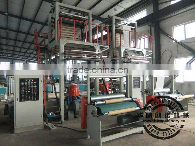 Machine a extruder et a souffler le film
