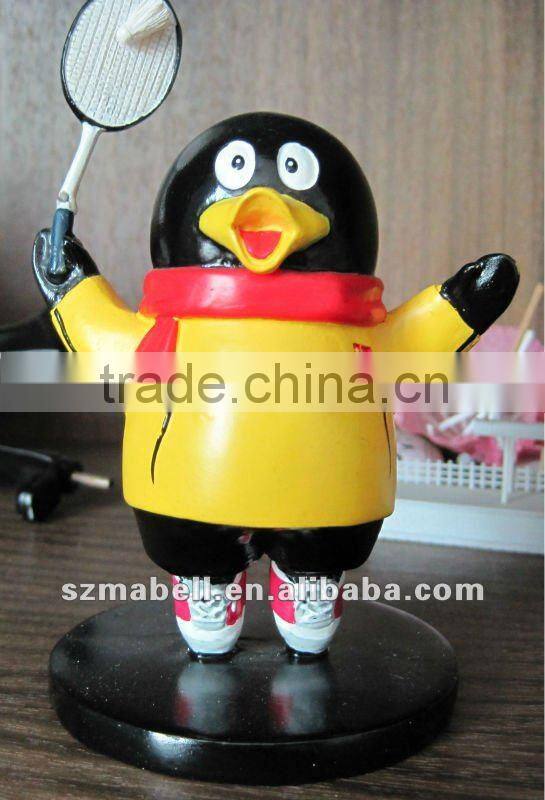 Playing badminton penguins toys