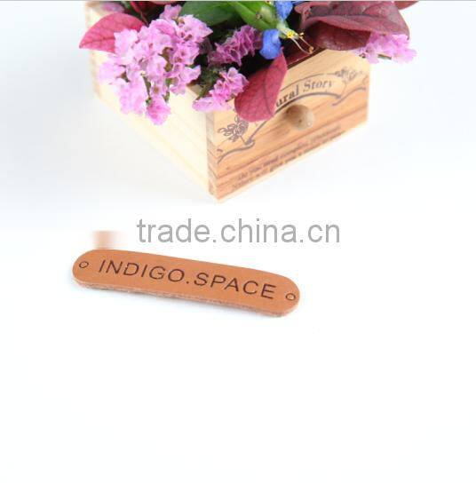 Wholesale factory direct fashion custom faux leather labels and tags for clothing