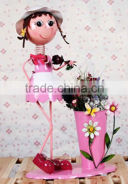 metal doll with flower used for home decor