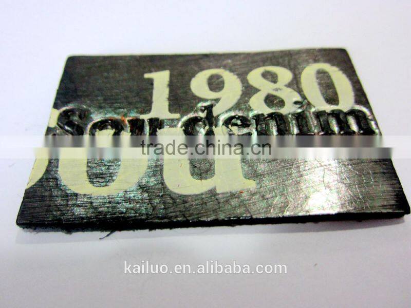 Embossed logo leather label for jeans
