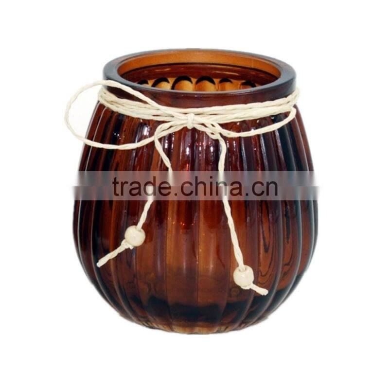 small pumpkin glass candle holder