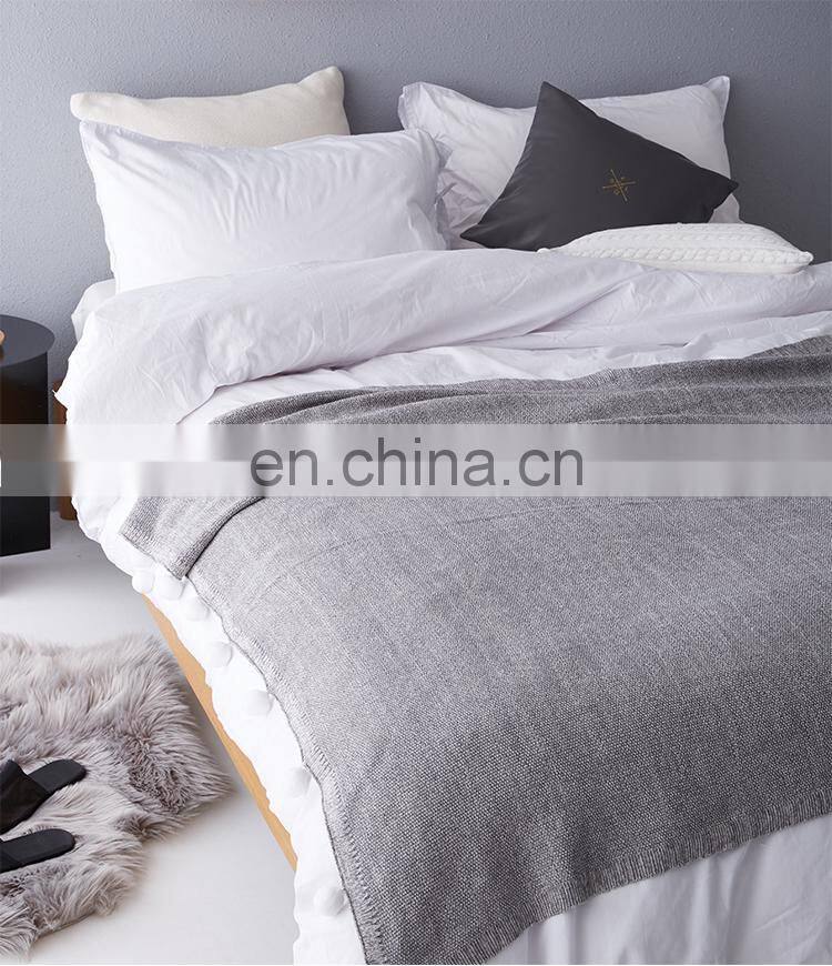 RAWHOUSE new design gray 100% cotton throw knitted pom pom blanket in stock