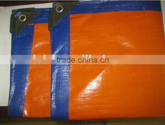 orange pe fabric with plastic corner ad eyelet