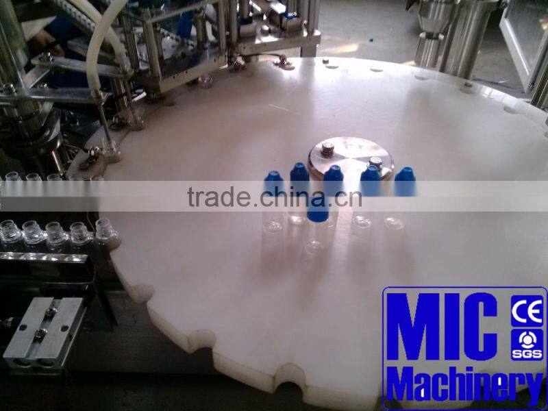 Micmachinery easy control liquid filling machine 30ml Oral liquid filling machine Vial filling plugging capping machine