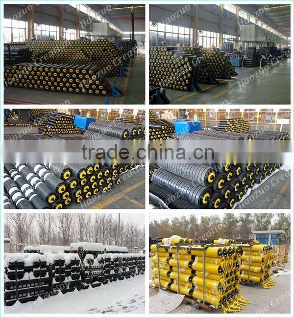 Return idler rollers with spaced rubber rings