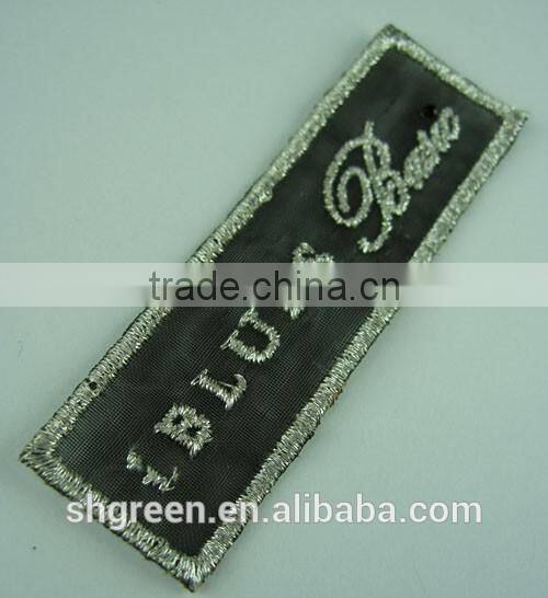 Textile embroidery patch with 3D logo