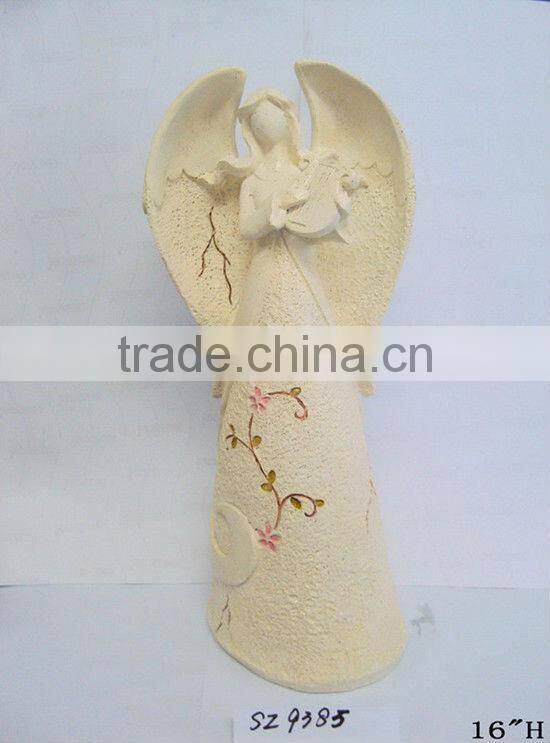 Resin fairy with a snail statue sculpture