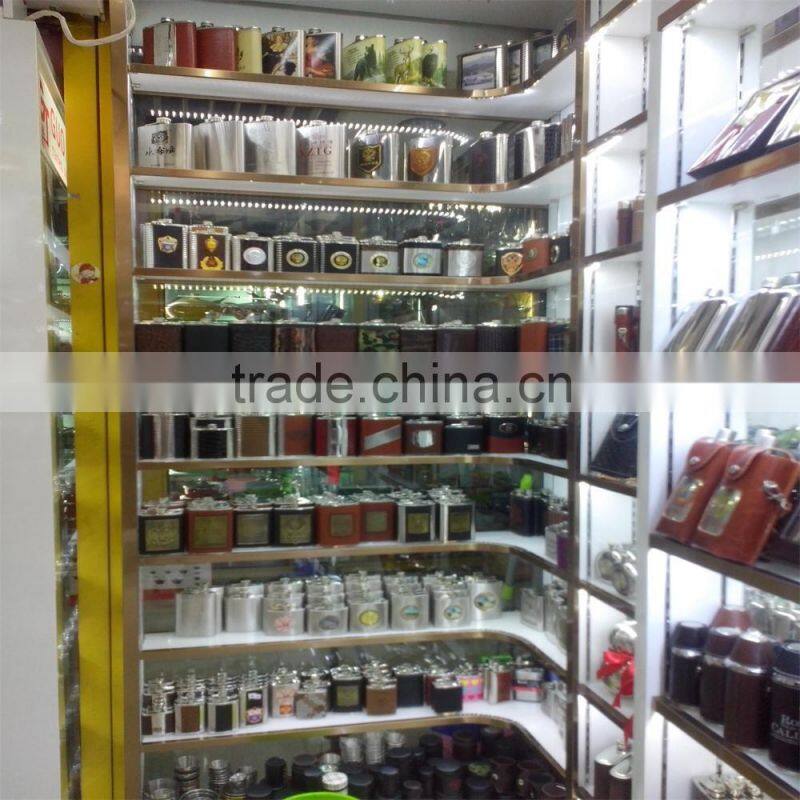 42oz round hip flask with print logo and spray pain coating then in leather bag.