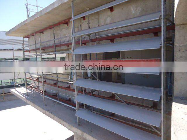 Curved perforated aluminum sun louver/screen (C E)