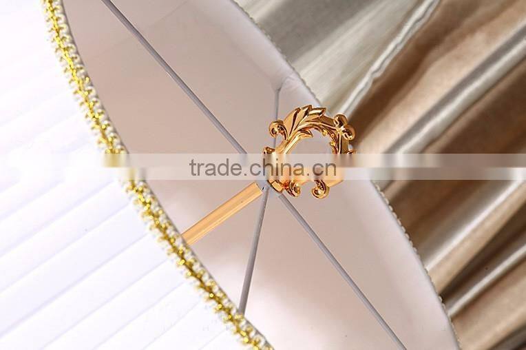 Golden plated metal clear K9 crystal floor lamp with white fabric lampshade