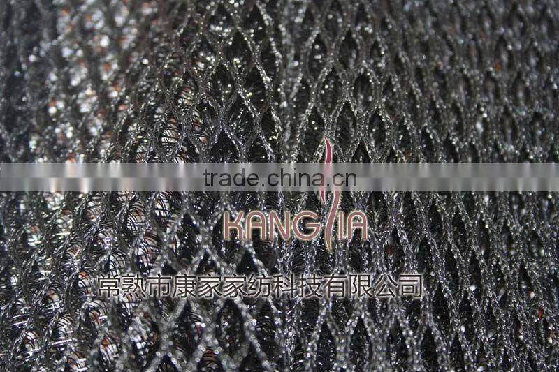 Warp knitted spacer mesh fabric