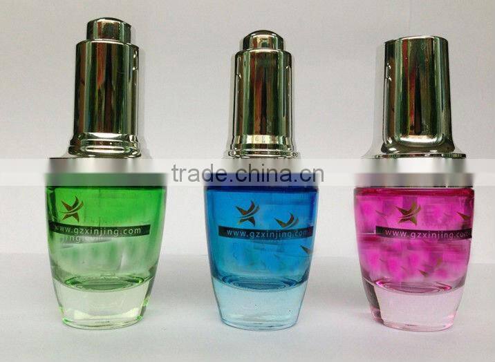 beautiful colored essential oil glass bottle