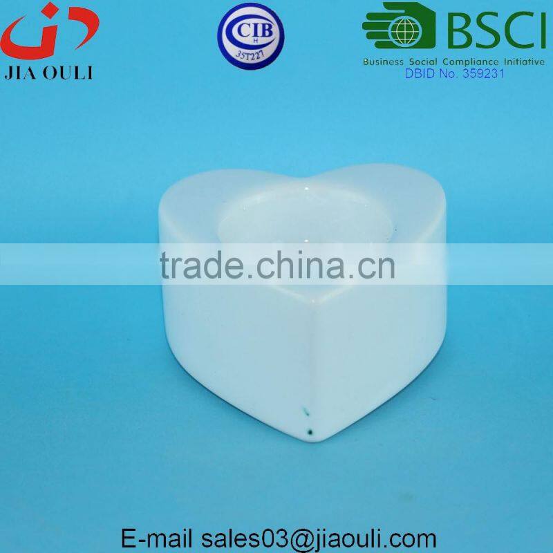 BSCI Audit Factory New design dimple ball shape White Ceramic tea light holders