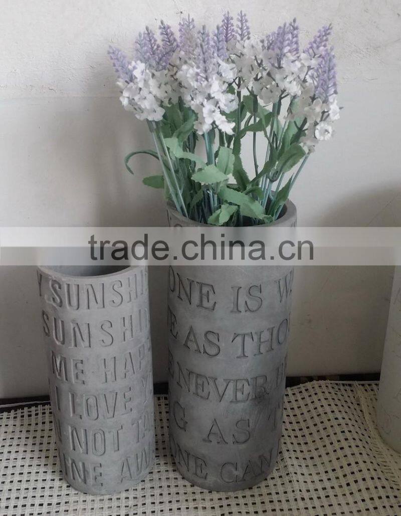 Cheap cement pot with fake plants