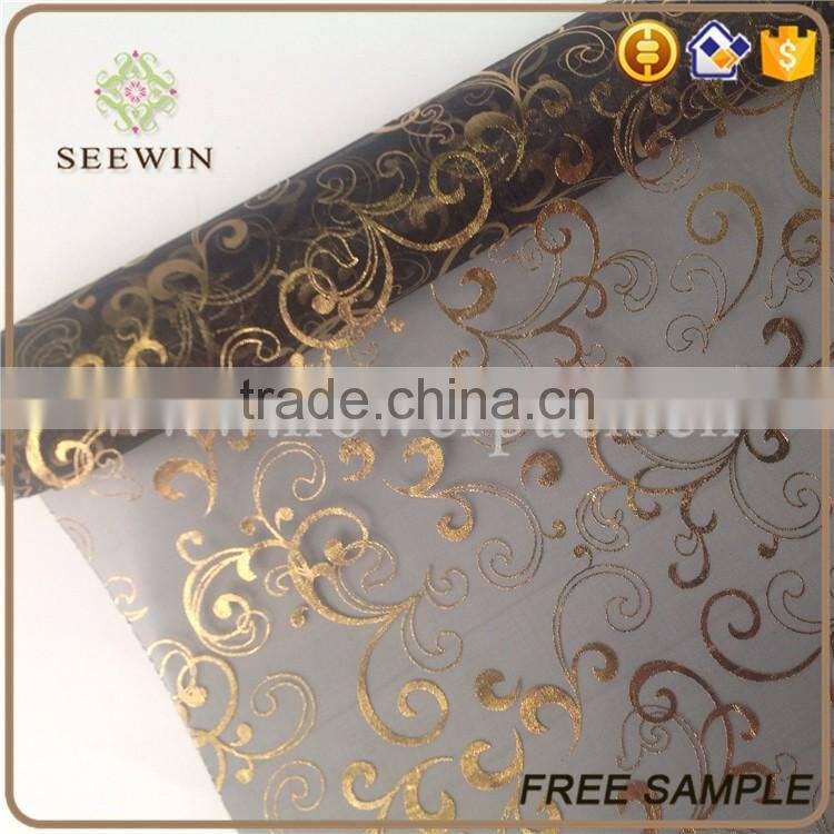 gilding rolls of organza fabric