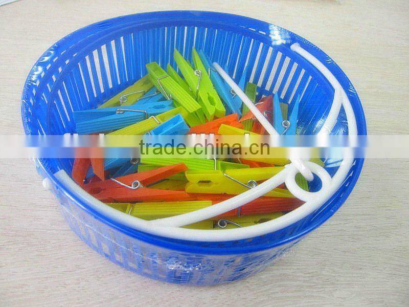 New foldable plastic basket with colorful clothes pegs