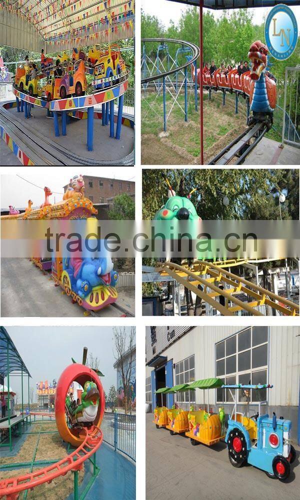 Amusement park children electric train toy ride slide dragon train/roller coaster for sale