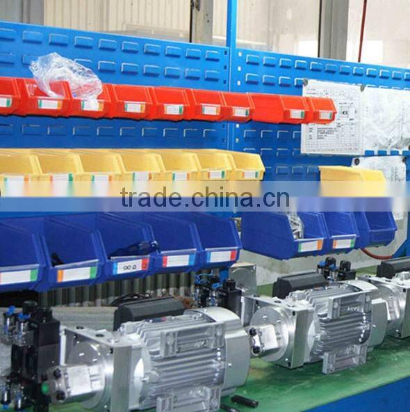 Hydraulic power unit for small dump truck & platform stacker