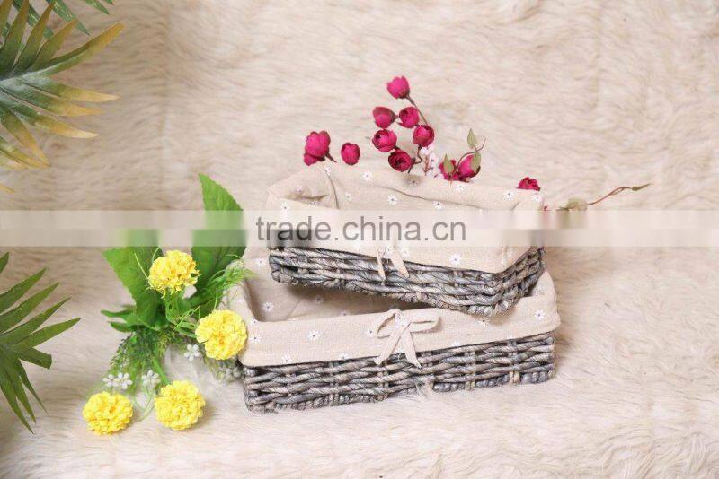 set of 2 maize weaved remote storage baskets