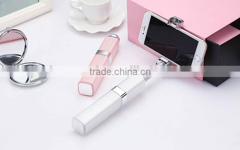 2016 New Wholesale mini automated selfie stick lip gloss selfie stick with cable for iphone and Android Smart phone