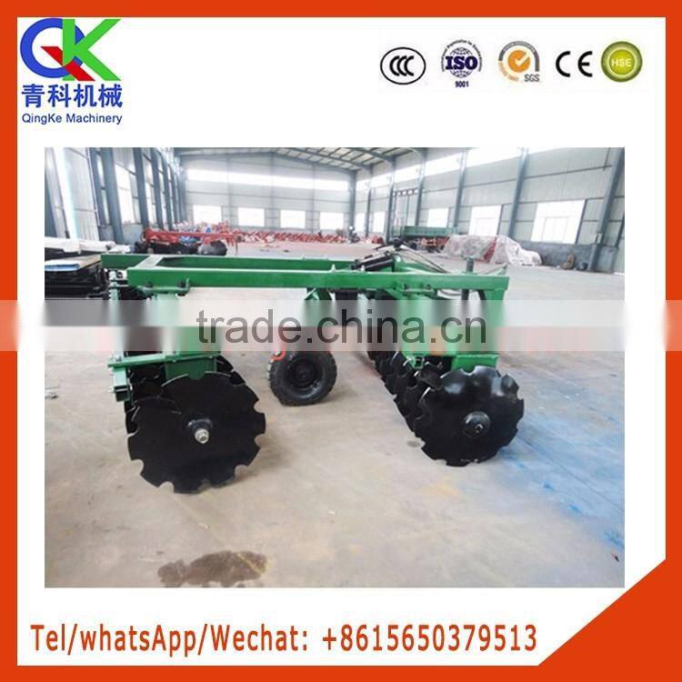 Hydraulic traction heavy harrow with hydraulic lifting tyres