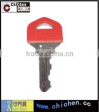Brass door key