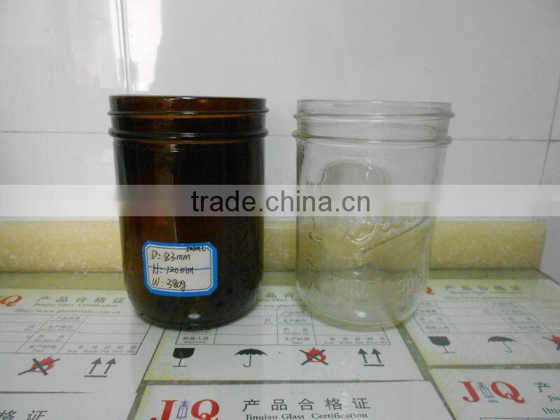 amber and clear glass mason jar