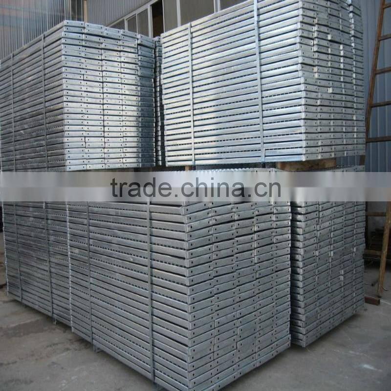 Galvanized metal walk board with hook for building scaffolding system