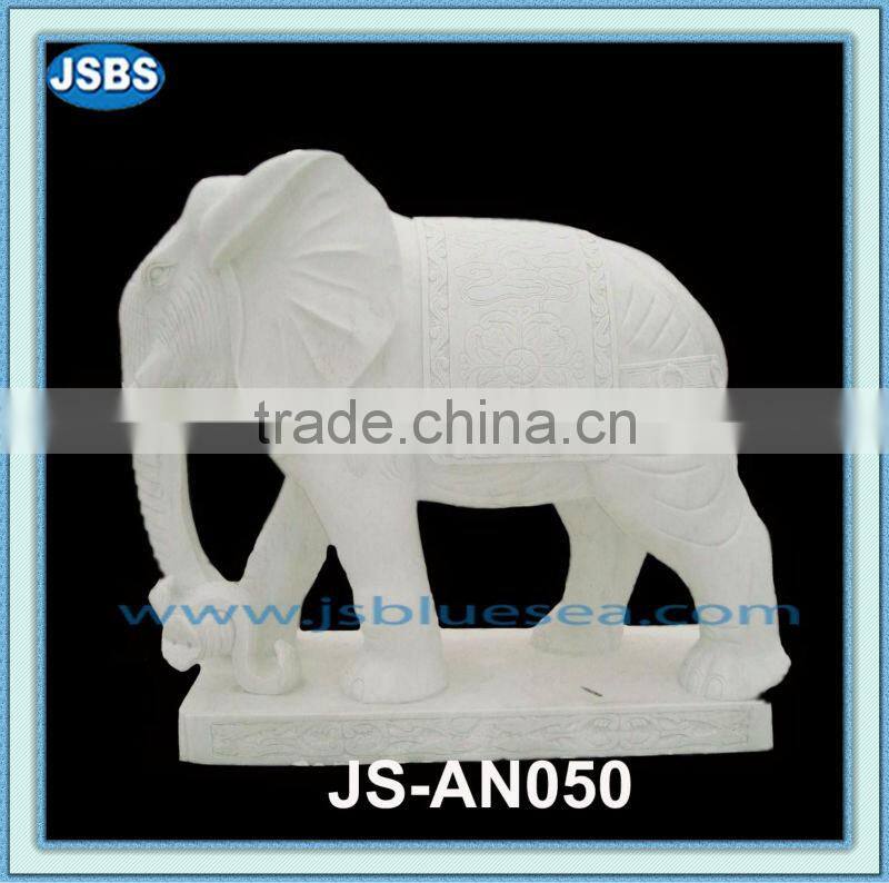 carved outdoor white elephant statues