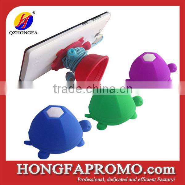 Silicone mobile phone holder with earphone wrap