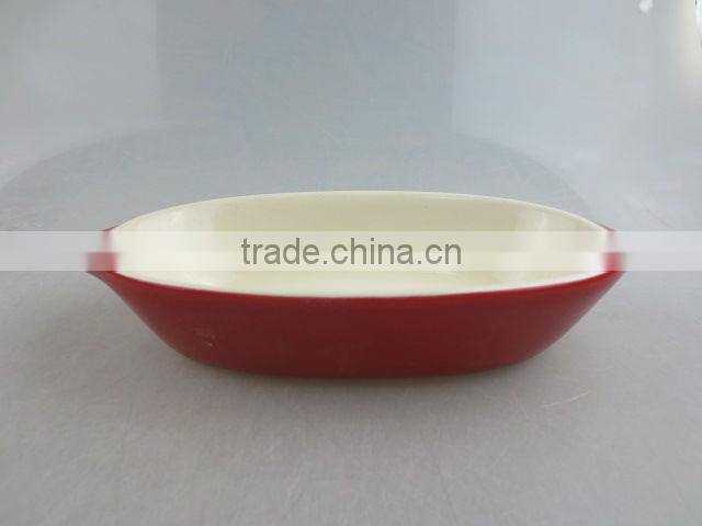 red-glazed ceramic oval tableware