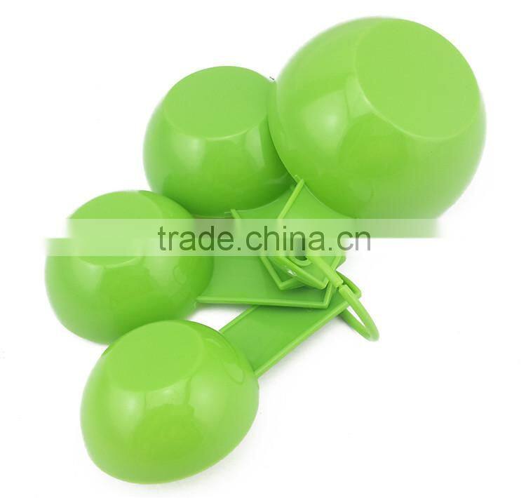 Small plastic measuring cups