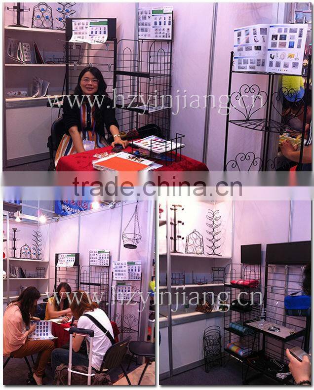 China supplier hot selling good quality sturdy unique attractive metal dinosaur wine bottle rack