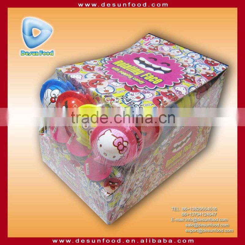 assorted cartoon design rotating face toy candy