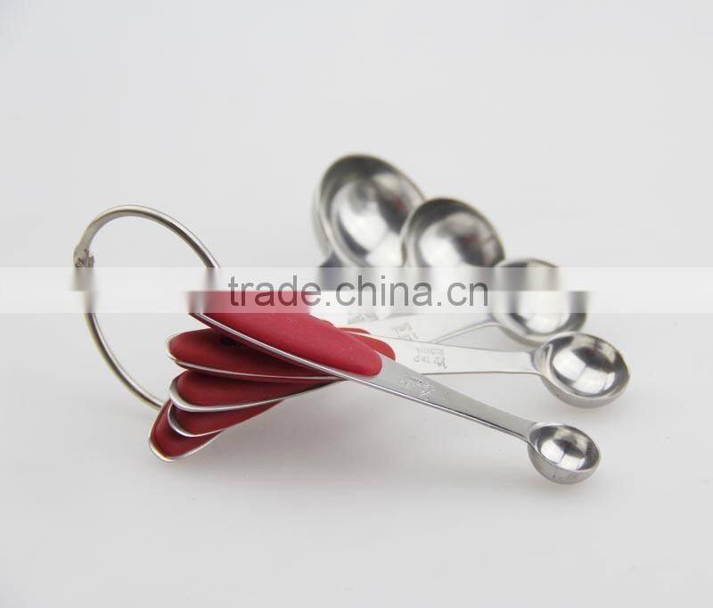 Measure spoon with silicone handle