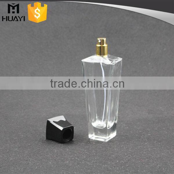 empty perfume bottle glass with black cap