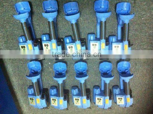Battery powered automatic high tension plastic strapping tool