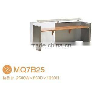 Black tufted reception desk made with tempered glass