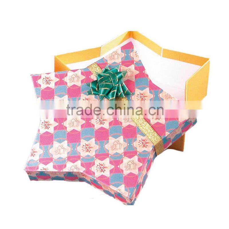 gold round gift box with ribbon design