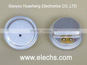 Wide frequency rocking armature transducer