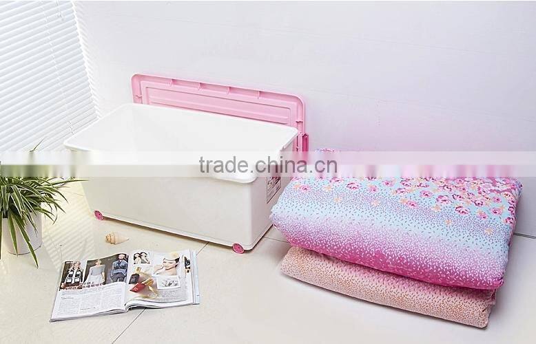 Plastic clothes storage box with wheels