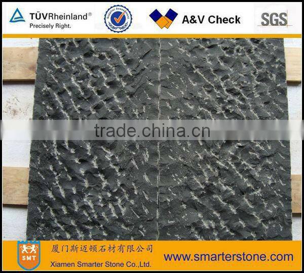 Bush hammered paving stone basalt with honeycombs
