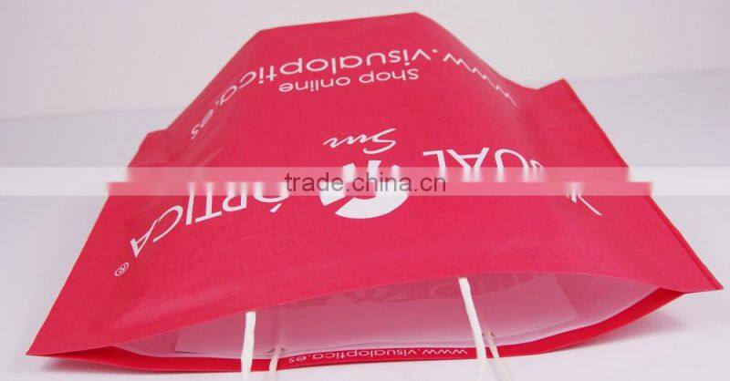 Simple stand up red kraft paper bags with white twisted handle