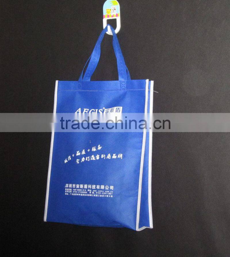 Blue nonwoven bag with white logo printing