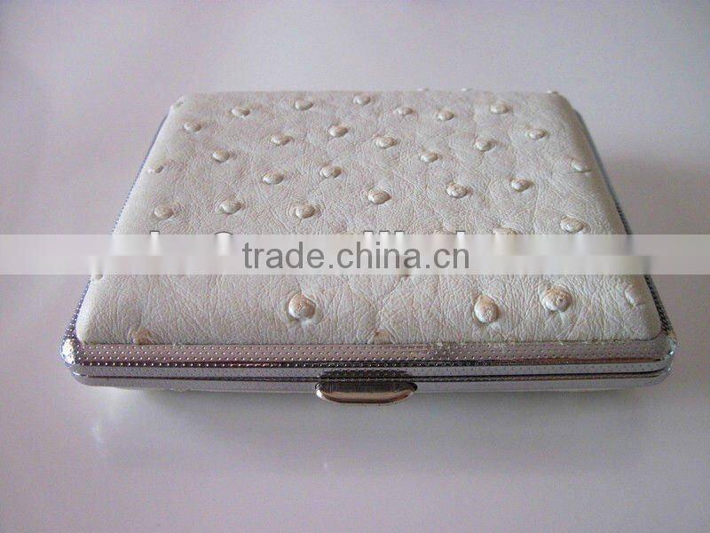 Metal cigarette case. Leather cigarette box.