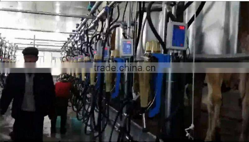 Milking Machine System with Automatic Cluster Remover