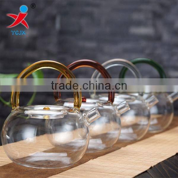 new design pyrex glass tea pot with colored glass handle