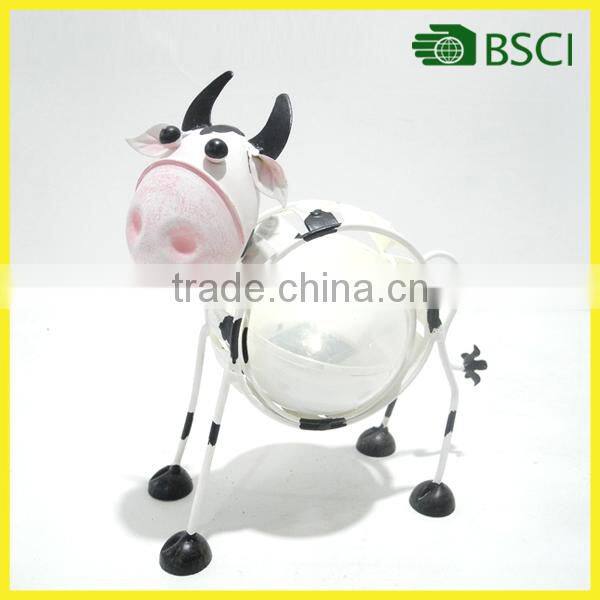 Metal solar light for garden decoration cow